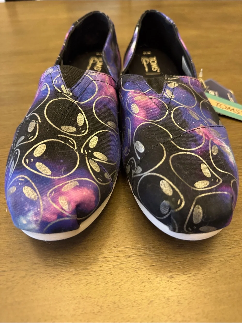 Toms Women’s Alien Galaxy Slip-On Sneakers in Purple, Black and Pink
